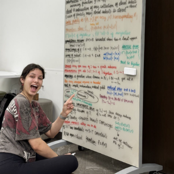 student using whiteboard
